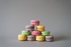 Pastel macarons are stacked in a neat pile to represent a marketing tech stack that’s quickly going stale.